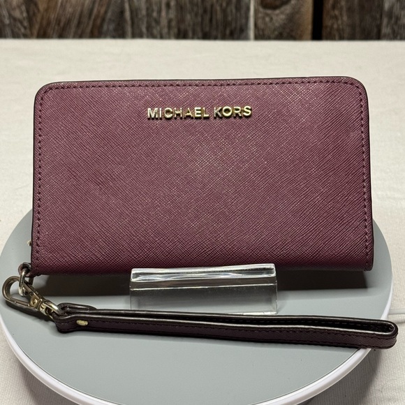 Michael Kors Plum Wristlet - Picture 1 of 3